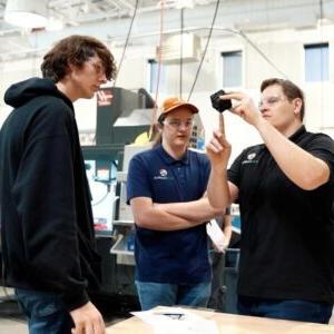 Dan Steepleton with EPIC students in the CNC lab