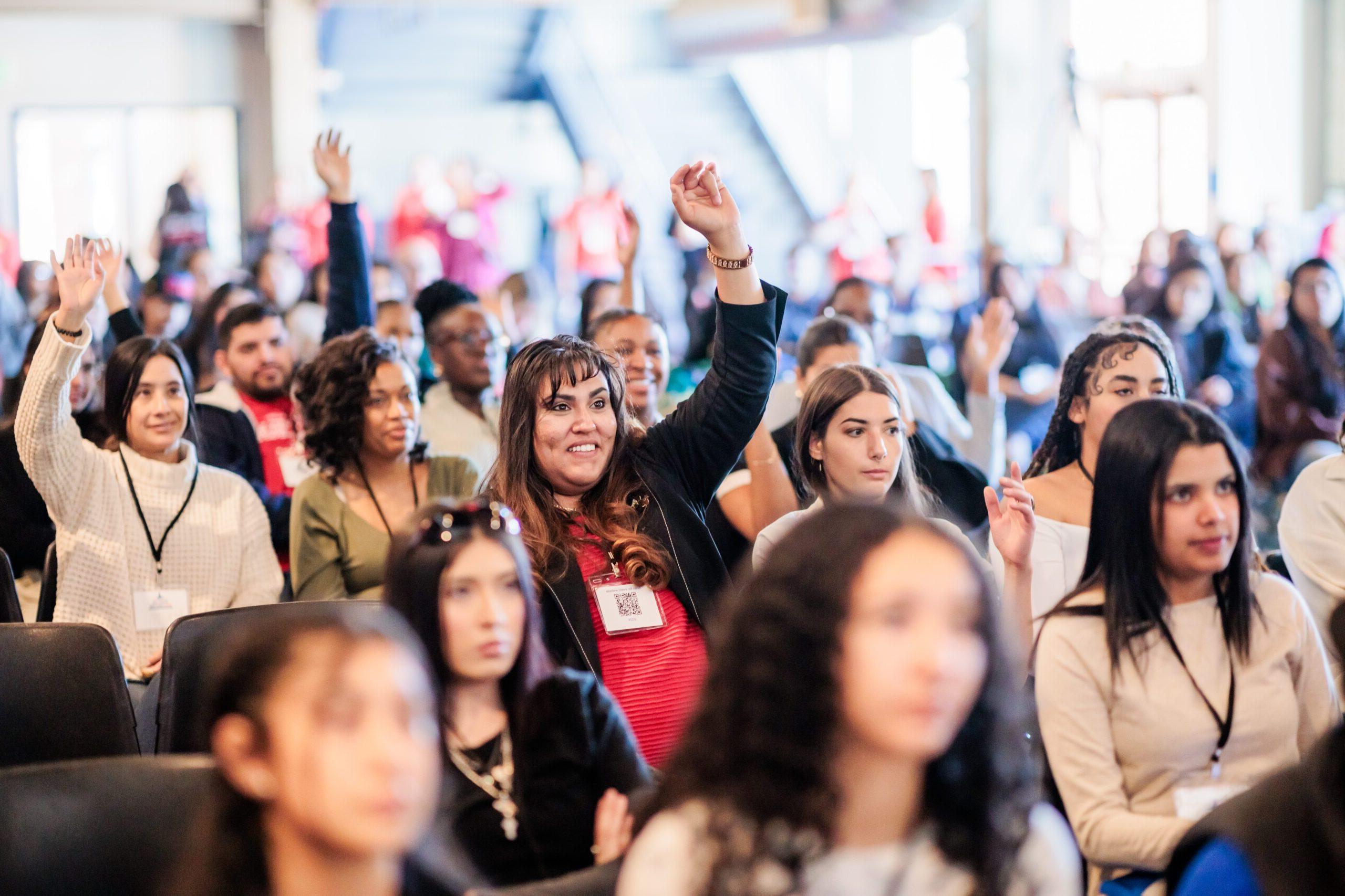 Student raising their hands